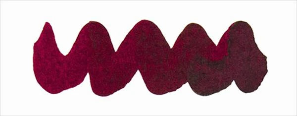 Diamine Writers Blood fountain pen ink cartridge, international size, with deep red ink visible inside the cartridge.