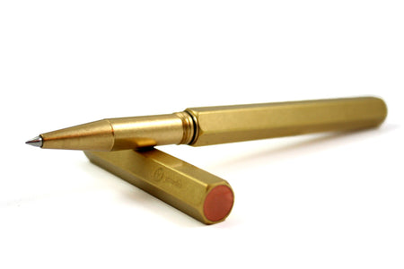 Y Studio Classic Revolve rollerball pen in brass with sleek design and polished finish, showcasing its elegant writing instrument features.