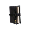 Large black Italian leather refillable latch journal or 2025 planner by Il Cartiglio, open to pages with handwritten notes.