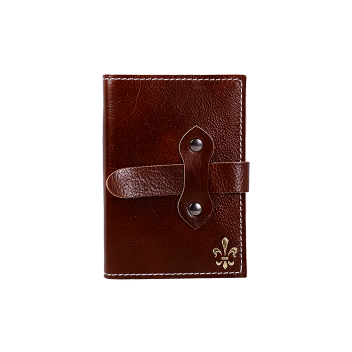 Large refillable Italian leather latch journal or 2025 planner by Il Cartiglio, featuring a rich brown cover and daily planning pages.