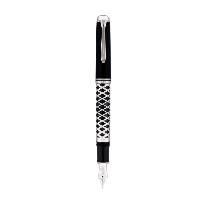Pelikan Souverän M805 fountain pen with metal sleeve, featuring a black body and gold accents, displayed on a white background.