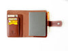 A6 leather journal cover in English tan from Eng Leather Co., featuring a sleek, natural leather finish and secure closure.