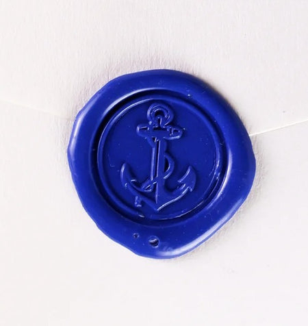 Brass wax seal with anchor symbol, crafted for sealing documents and adding a vintage touch to stationery.
