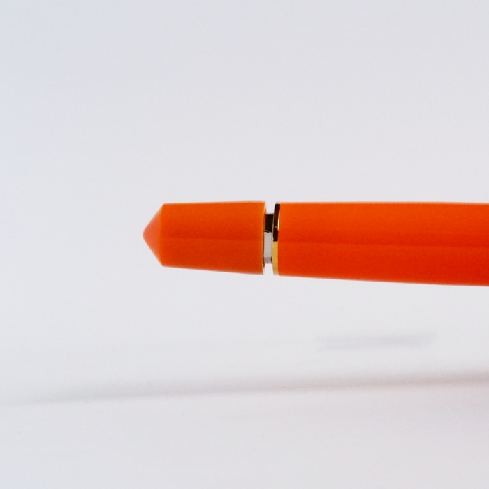 Armando Simoni Club ASC Bologna Portofino Bespoke 2024 in vibrant orange with gold accents, showcasing a luxury leather product.