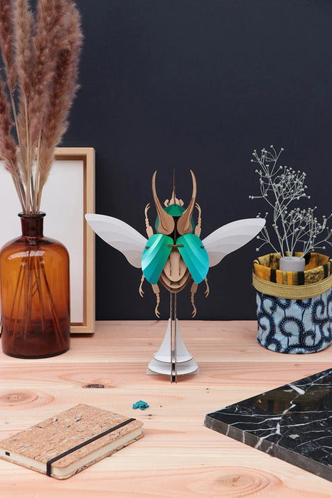 Assembli Paper Atlas Beetle craft in vibrant colors, showcasing a detailed large paper insect for arts and crafts projects.