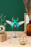 Large paper stag beetle craft by Assembli, featuring detailed paper wings and body on a transparent stand.