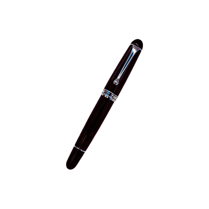 Aurora Ebonite Magenta fountain pen with smooth black grip and gold accents, showcasing elegant design and fine craftsmanship.
