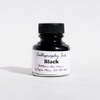 Black bottled calligraphy ink by Papier Plume in a glass bottle, showcasing smooth, rich ink ideal for elegant calligraphy writing