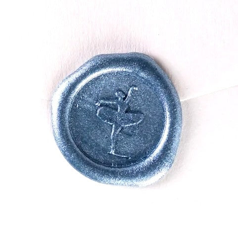 Brass wax seal with ballerina symbol from Papier Plume, showing intricate ballet dancer design on a circular seal.