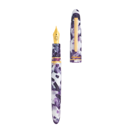 Open Esterbrook Estie Bestie fountain pen with purple resin body and gold accents, showcasing its elegant design and nib.