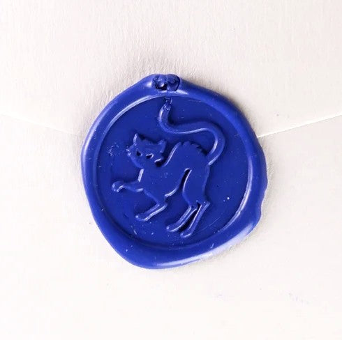 Black brass wax seal featuring a cat symbol, crafted by Papier Plume, ideal for sealing letters or adding vintage charm.