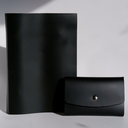 Black Papier Plume Swatch Book set with color samples and sample pages visible in the image.