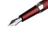 Close-up of a Diplomat Cobra fountain pen in burgundy red, showing the nib section and elegant design details.