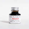 Papier Plume fountain pen ink in caramel color, bottle of rich, smooth ink for writing and calligraphy.