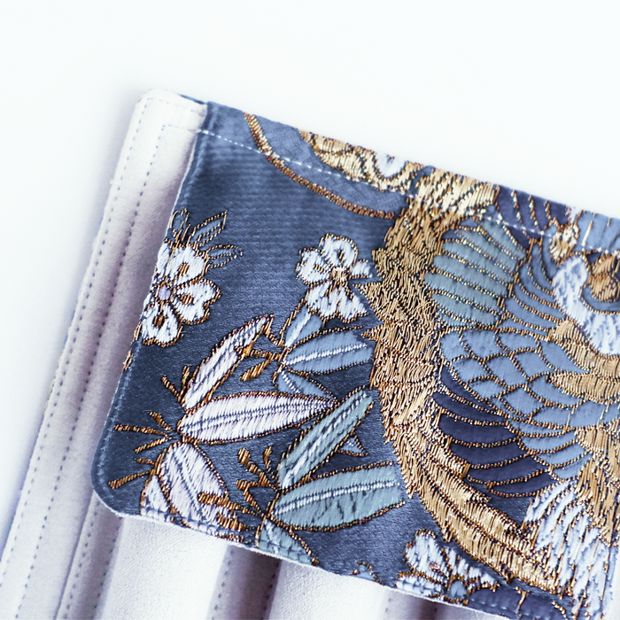 Cathay Sunborn Phoenix pen case with sleek design, featuring vibrant phoenix artwork and multiple compartments for writing instruments.