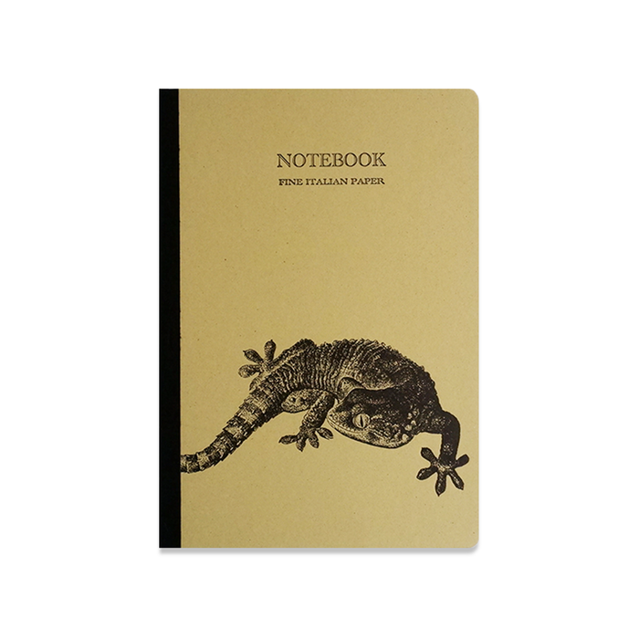 Rossi Chameleon journal with colorful cover featuring a chameleon design, open to pages with lined and blank sections for notes.
