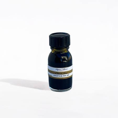 Papier Plume fountain pen ink in vibrant citron vert green with a glass ink bottle and label visible.