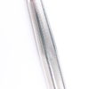 Close-up of a textured sliver pen on a light gray background