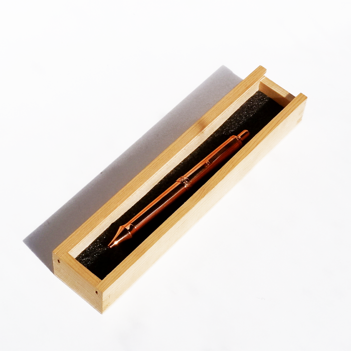 Copper Jean Pierre Lepine ballpoint pen by Papier Plume with a sleek metal finish and elegant design.
