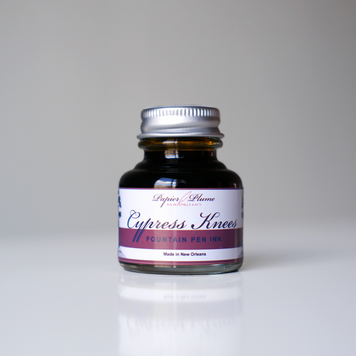 Papier Plume Cypress Knees fountain pen ink in 30ml bottle, dark green ink with subtle shading, suitable for elegant writing and calligraphy.