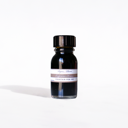 Papier Plume Cypress Knees fountain pen ink in a 15ml bottle with a clear label and black cap, designed for smooth writing.