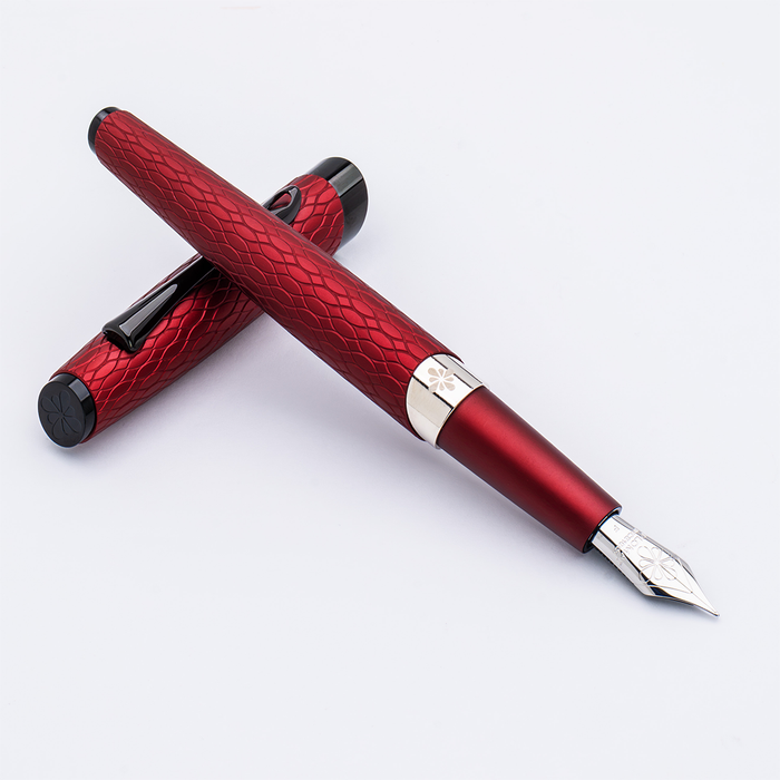 Diplomat Cobra fountain pen in burgundy red with a sleek design and gold accents, displayed on a white background.