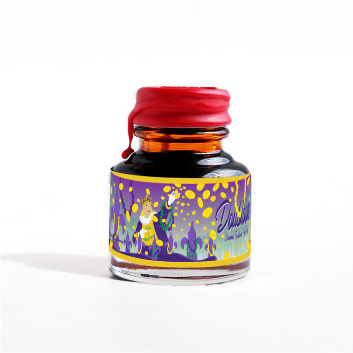 Papier Plume Doubloon shimmer fountain pen ink bottle with gold accents, showcasing the elegant ink inside.