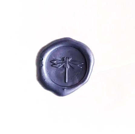 Brass wax seal stamp featuring a detailed dragonfly symbol, ideal for sealing letters and adding a vintage touch.