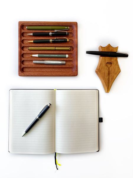 Eng Leather Co. wooden pen tray with compartments for organizing pens and stationery, crafted from elegant leather and wood.