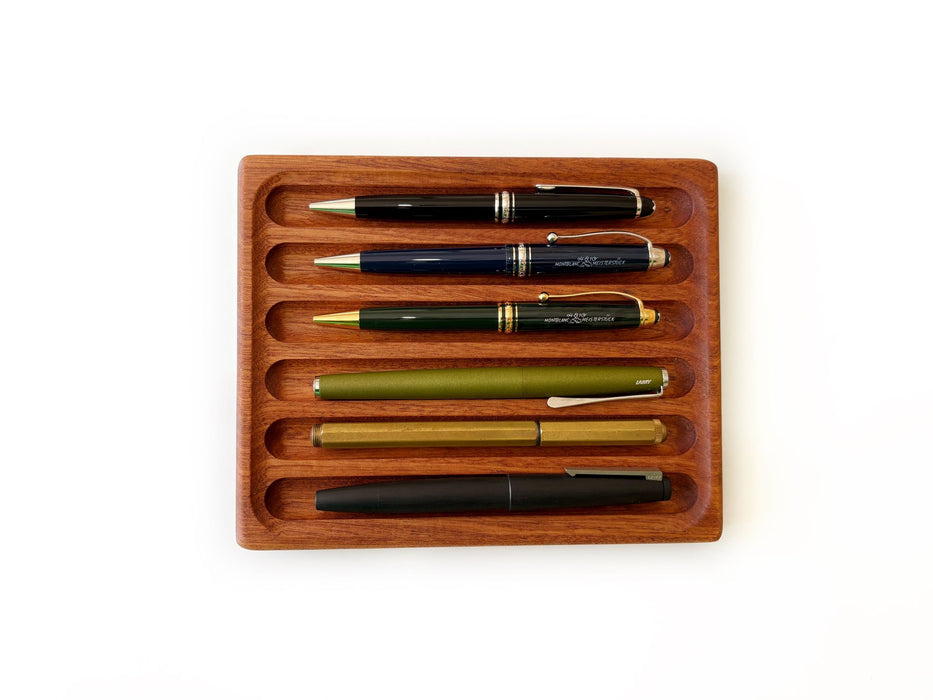 Eng Leather Co. wooden pen tray with compartments for organizing pens and stationery, crafted from durable leather and wood.