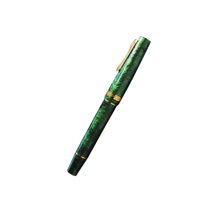 Gioia Metis 2.0 fountain pen in emerald green with gold accents, showcasing a sleek design and smooth ink flow.
