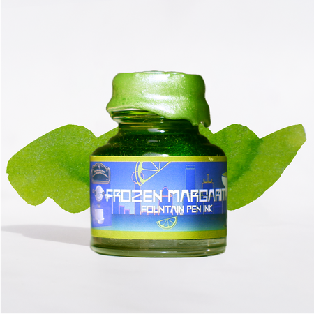Papier Plume Frozen Margarita shimmer fountain pen ink in a bottle, showcasing vibrant, shimmering turquoise ink for fountain pens.