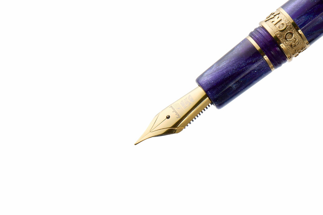Esterbrook The Rockstar Estie fountain pen with a sleek black finish and gold accents, shown with its cap removed.