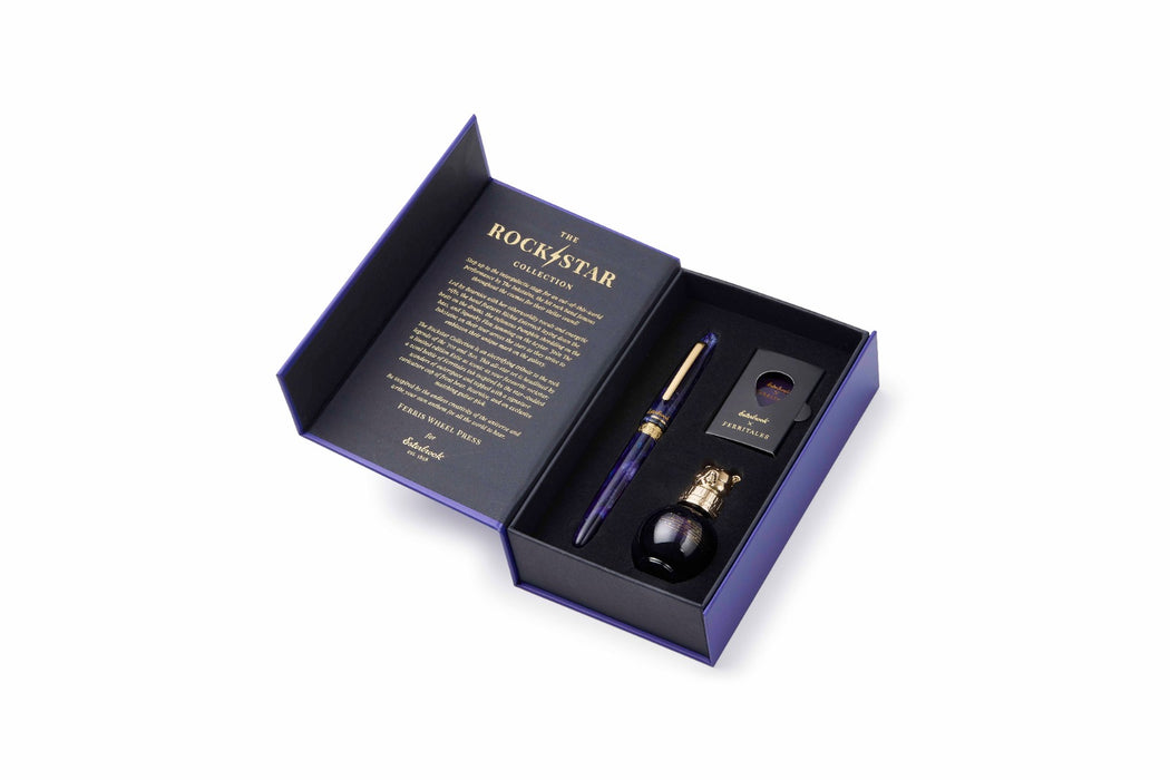 Esterbrook The Rockstar Estie fountain pen with a sleek black body and gold accents, showcasing its elegant design and craftsmanship.