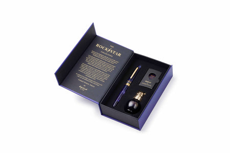 Esterbrook The Rockstar Estie fountain pen with a sleek black body and gold accents, showcasing its elegant design and craftsmanship.