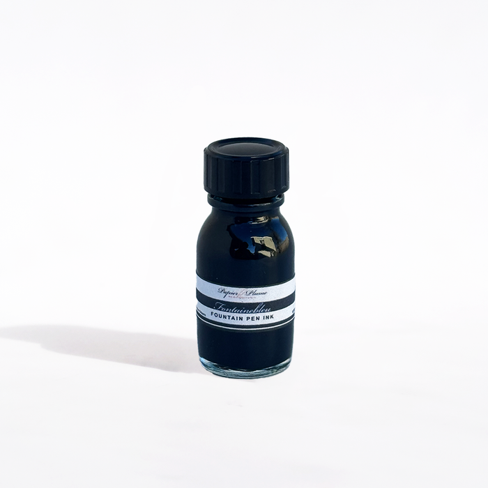Papier Plume fountain pen ink set of 12 bottles in 15ml each, featuring vibrant blue ink colors for writing and calligraphy.