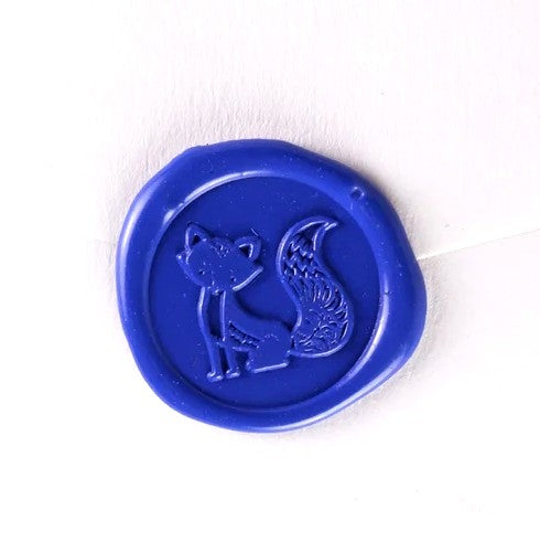 Brass wax seal stamp with fox symbol from Papier Plume, featuring intricate design ideal for sealing letters and invitations.