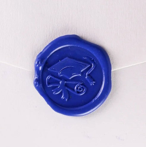 Brass wax seal with graduation symbol for sealing letters and documents, featuring intricate engraved design by Papier Plume.