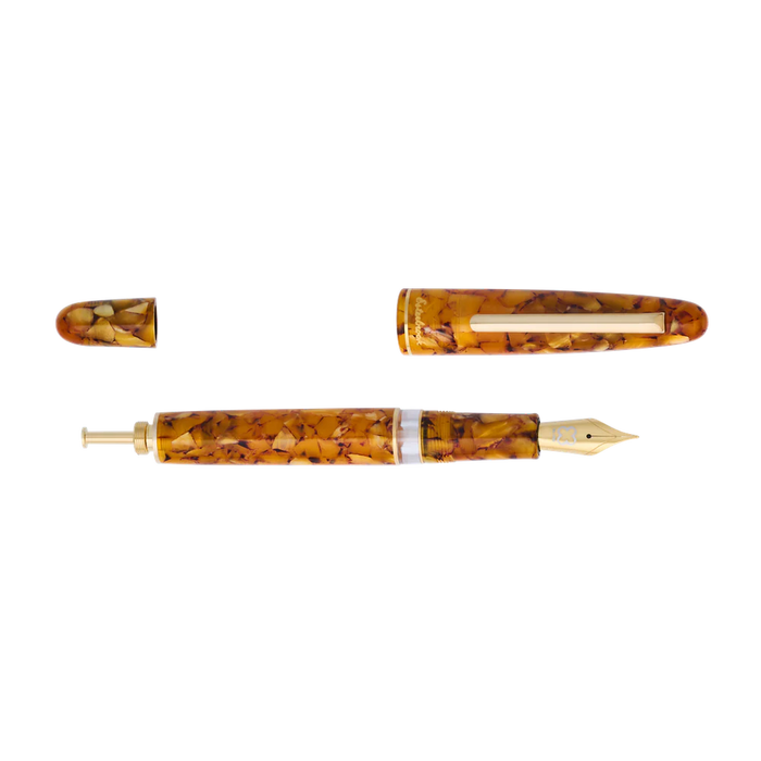 Esterbrook Estie fountain pen with honeycomb piston push button, showcasing its elegant design and gold accents.