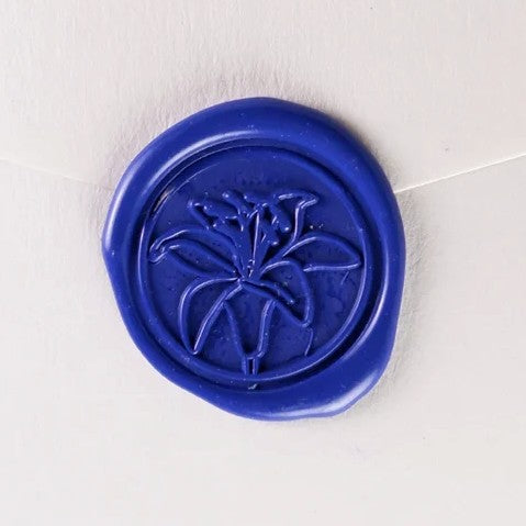 Brass wax seal with symbol design, crafted for sealing letters and invitations, by Papier Plume.