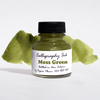 Moss green calligraphy ink in a glass bottle from Papier Plume, showcasing vibrant ink inside and the product label.