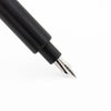 Monteverde Axis fountain pen with black body and silver accents, showing the nib and sleek design on a white background.
