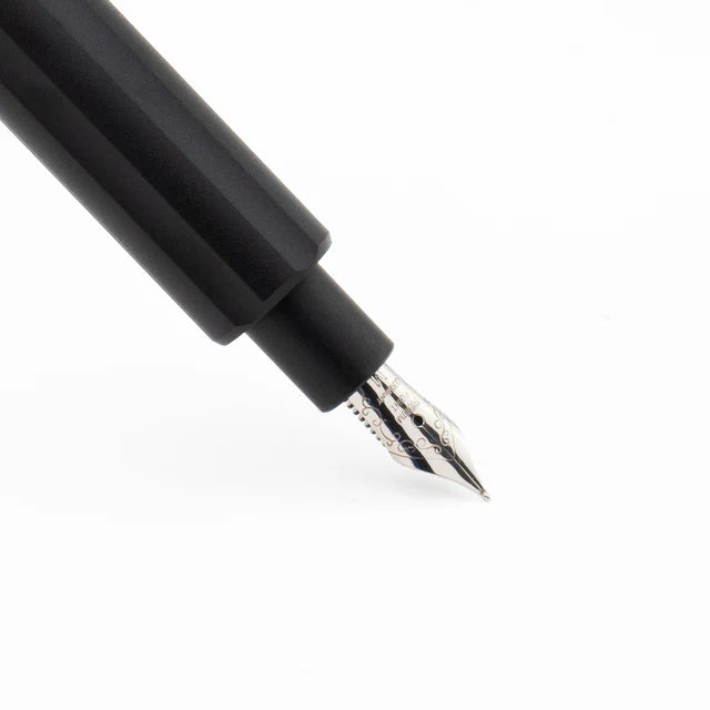 Monteverde Axis fountain pen with black body and silver accents, showing the nib and sleek design on a white background.
