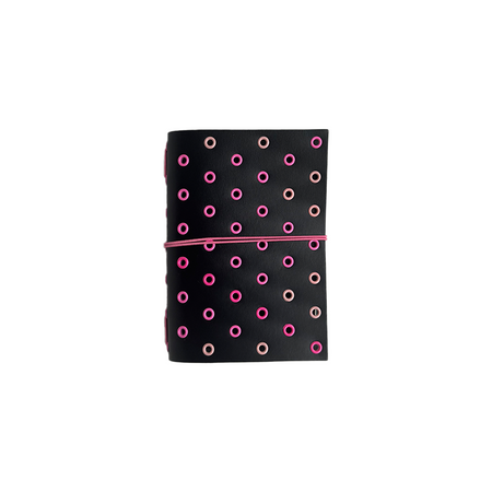 A black A6 bifold journal cover with pink grommets and Raven design by Imperfect Concepts.