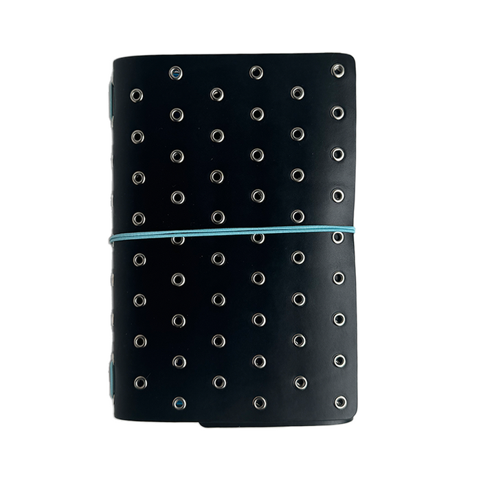 Imperfect Concepts Niko Raven journal cover featuring silver grommets and a tri-fold design, made for B6 size notebooks.