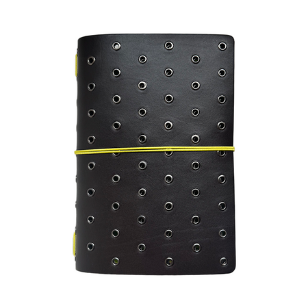B6 journal cover by Imperfect Concepts, Niko model in umber leather with bronze grommets and fold-over design.