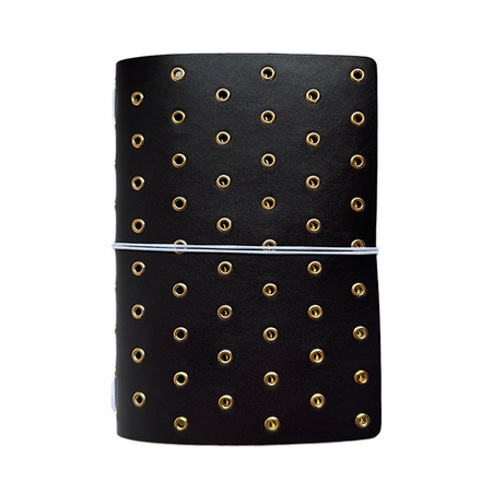Imperfect Concepts Niko B6 trifold folio journal cover in umber leather with gold grommets and modern design details.