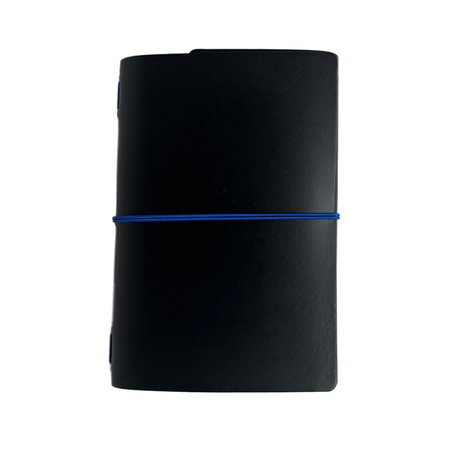 Imperfect Concepts Ollie Raven B6 trifold journal cover with red mini grommets, stylish and functional leather accessory.