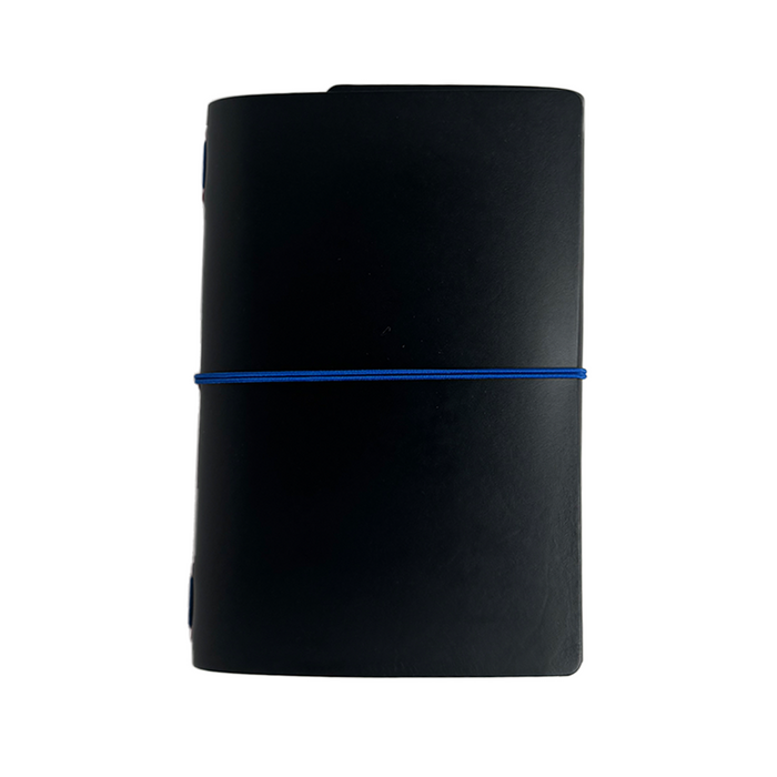 Imperfect Concepts Ollie Raven B6 trifold journal cover with red mini grommets, stylish and functional leather accessory.