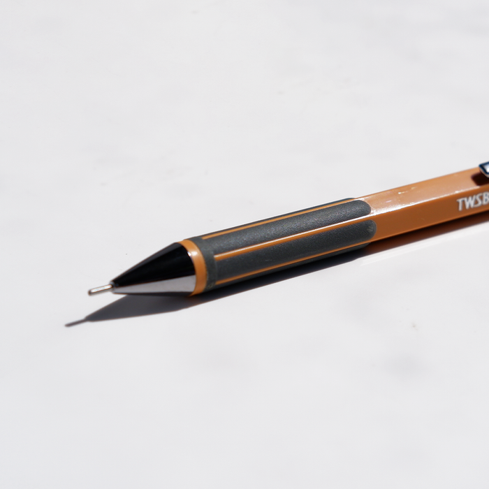 Twsbi Jr. Pagoda mechanical pencil in marmalade orange with 0.7mm lead, featuring a sleek design and ergonomic grip.